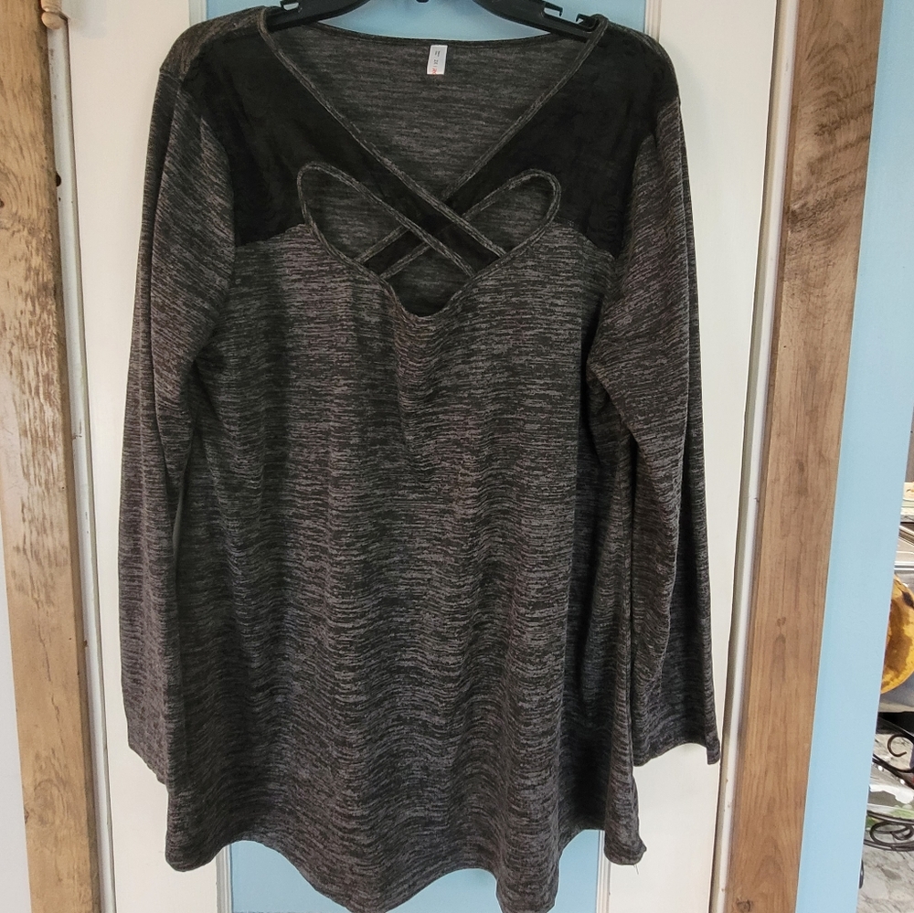 Woman's lightweight, long-sleeved top